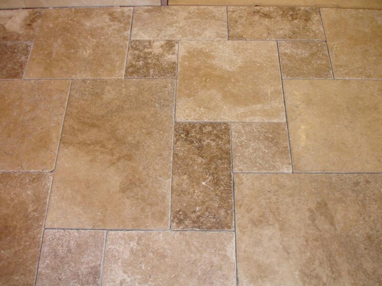 Dark Walnut Tumbled Trav display pre grout.jpg