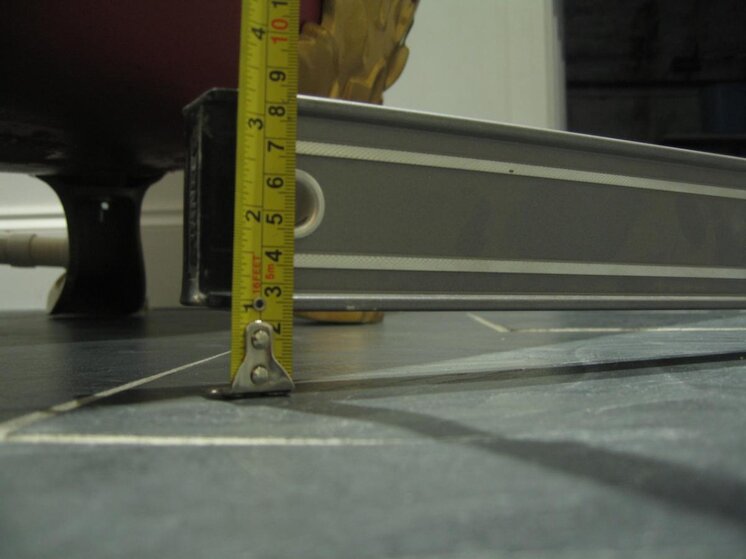 Slope, spirit level on floor other end.jpg