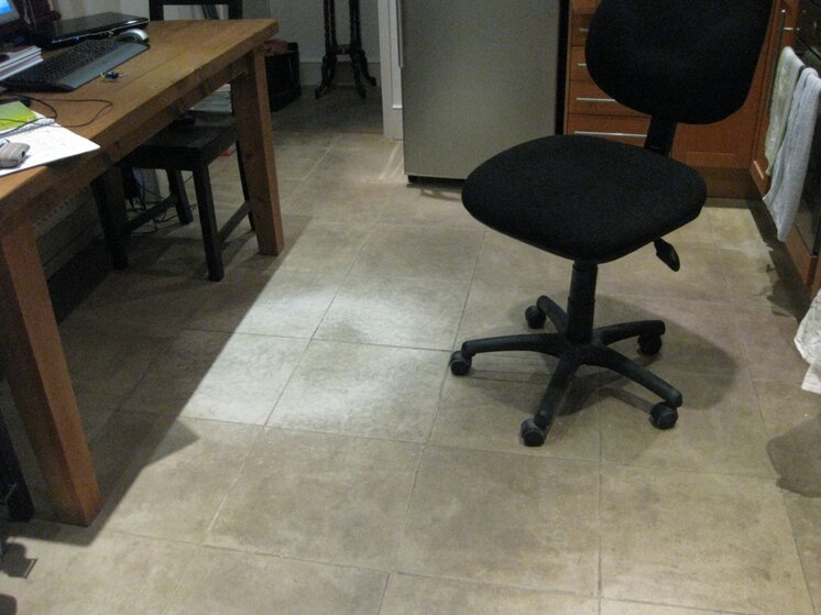 white patch left by chair wheels.JPG