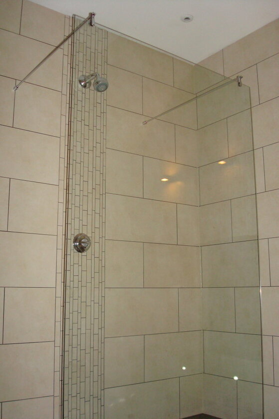 How long after grouting should you wait to use a new shower