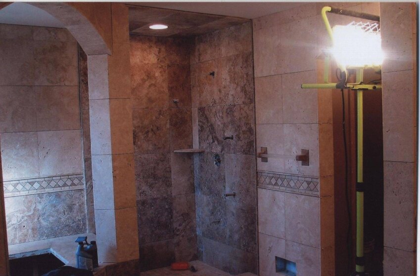 Travertine walk-in shower (1).jpg