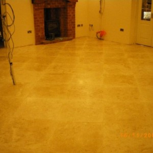 Travertine floor over UFH and insulation mats