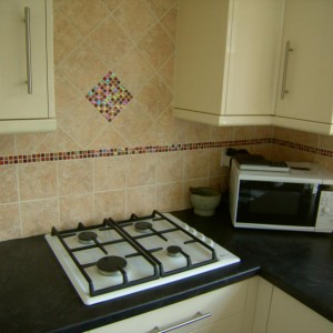 just a few from my previos tiling jobs!! :)  cant seem to upload some more as it says there to big!