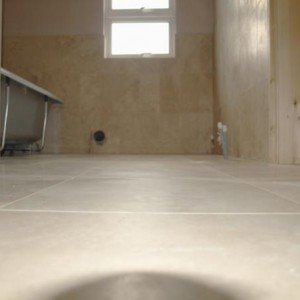 Honed filled travertine floor.