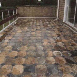 Slate tiling on a fiberglass coated balcony.