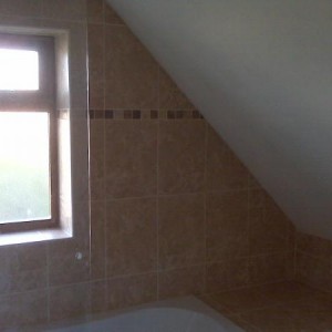 Bathroom tiling with sloping ceiling