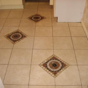 KITCHEN FLOOR WITH MOSAICS INSET