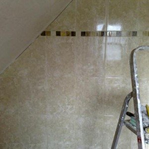 Bathroom tiling with sloping ceiling