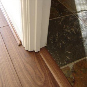 Rustic slate floor, and Quickstep 950 walnut flooring