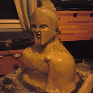 sealing the clay with shellac flakes and clear varnish mixture and firming the base with modelling clay  step 5