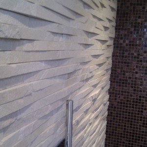 Bisazza and natural stone wetroom.