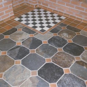 PATIO/FEATURE - AFRICAN SLATE WITH QUARRIES AND FEATURE CHESSBOARD.