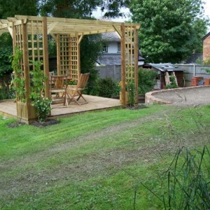 garden 9 - my new decking..to the right is the raised garden and beyond is the vegetable patch and shed..