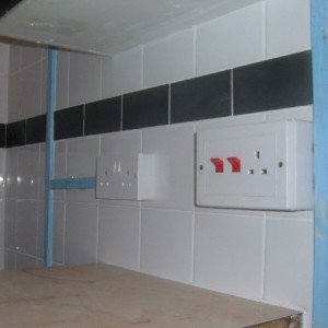 Tiled around conduit but sockets removed and miunted on tiles