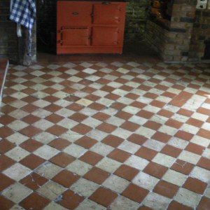 A very early quarry tiled floor where the customer wanted it to remain as it was (including tiling mistake - see pattern) and sympatheticaslly cleaned, partial grout to add strength and then clear linseed sealant.  Grade 1 listed property.