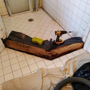 Rotted away old school shower.jpg