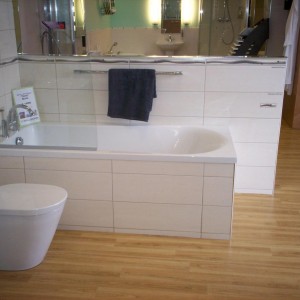 This bath sits in a kind of polysterene base that you can tile straight to,was very strange to use.