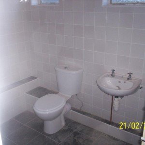 gray tiles and bathroom suite from B&Q