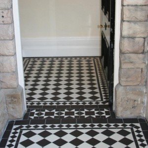 inner porch & threshold This floor prior to our work was split level inner porch was terrazzo and a good two inches above outer porch with a concrete step. outer porch was brush finished concrete. we used Olde english tiles.