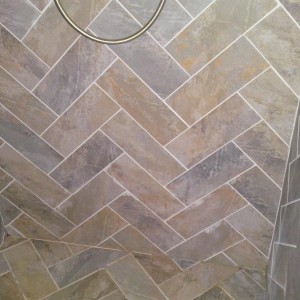 Herringbone - Hand cut from larger format tile to walls and floor in wetroom. 2