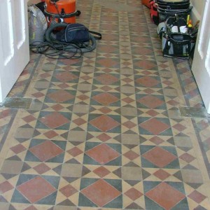 K TH main floor B4 it was cleaned and sealed the missing tiles have been replaced with new & re-claim