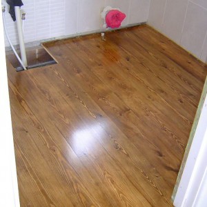 new floor, lightly sanded, stained (Rustins) and varnished (Bona Mega..4 coats) mmmm, shiny!