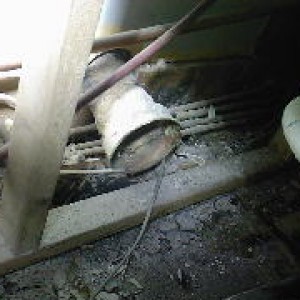 An old waste pipe that was left in, no wonder the room always stank!