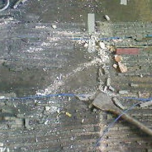 Ripping up the floor, note the gap between the UFH wires.......its 160mm!