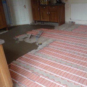 large under tile heating job( required its own circuit ) screeding in the element with 1 part flexi .