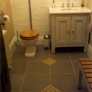 Hand made wall tiles FE.
FE floor tiles with mosaic insets.