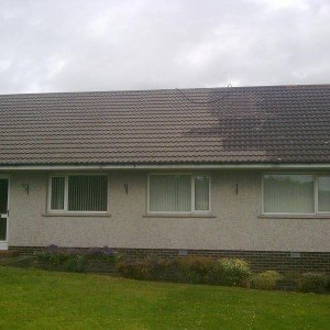 Powerhosing down the old roof tiles, old front door