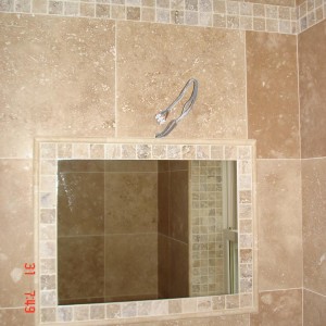 F&H Travertine 45x45 with a tumbled scabos mosaic border