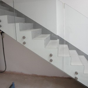 concrete stair case tiled with 1200 x 600 porcel-thin