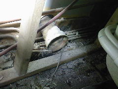 An old waste pipe that was left in, no wonder the room always stank!