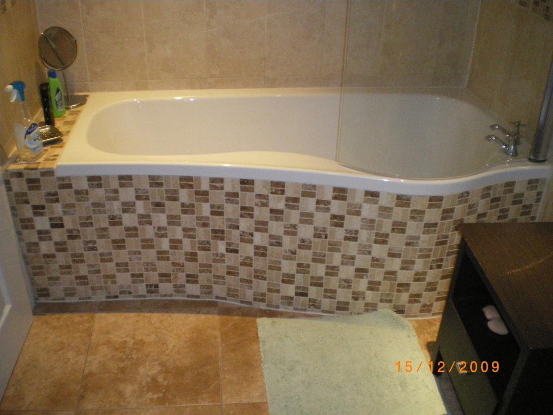 bath panel made up of marmox board, then stone mosaics fitted,grouted and siliconed