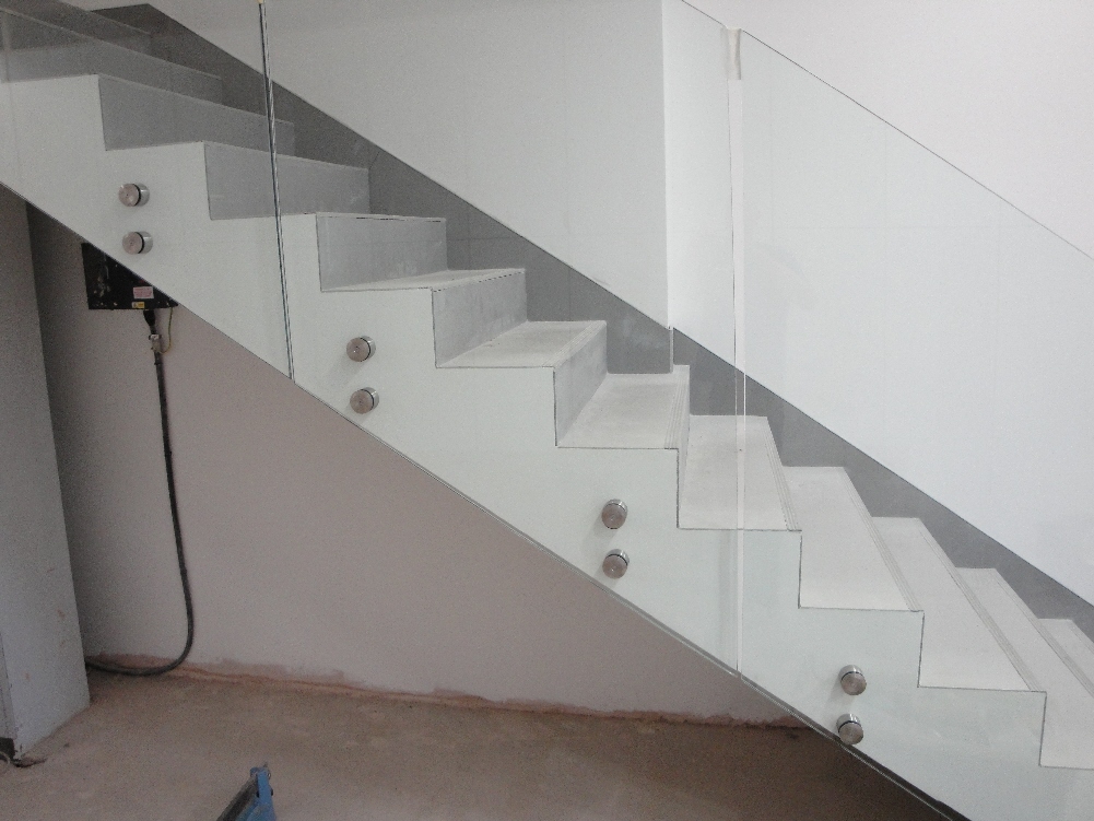 concrete stair case tiled with 1200 x 600 porcel-thin