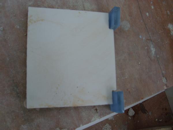 CUT  2 NOTCHES FROM A TILE