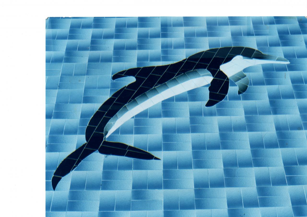 Dolphin  i know it is a cliche and i have done about 5 dolphins over the years but it is in harmony tiles from Johnsons it looked good and is still in good nick now although apparently the eye went white so the poor sod is blind now.