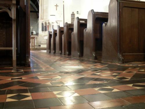 Early Victorian tiles that are in a church.  Impregnating sealant that was buffed to a low shine.  No Gulvpolish or surface sealant used, as it would have peeled off after 6 months due to damp.