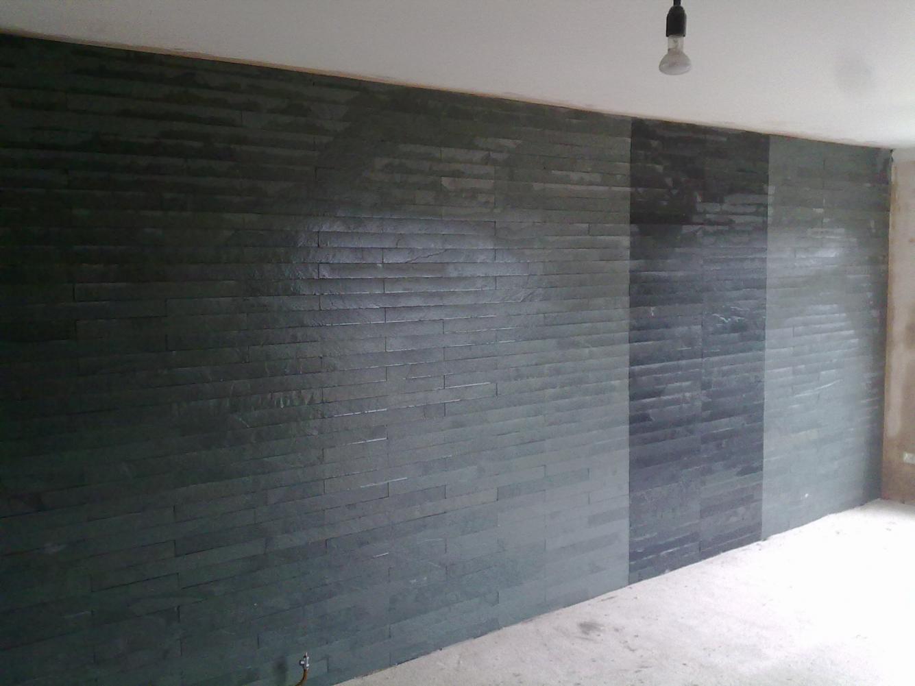 feature wall in artists lounge...600x10 green/grey and black brazillian slate, ungrouted.