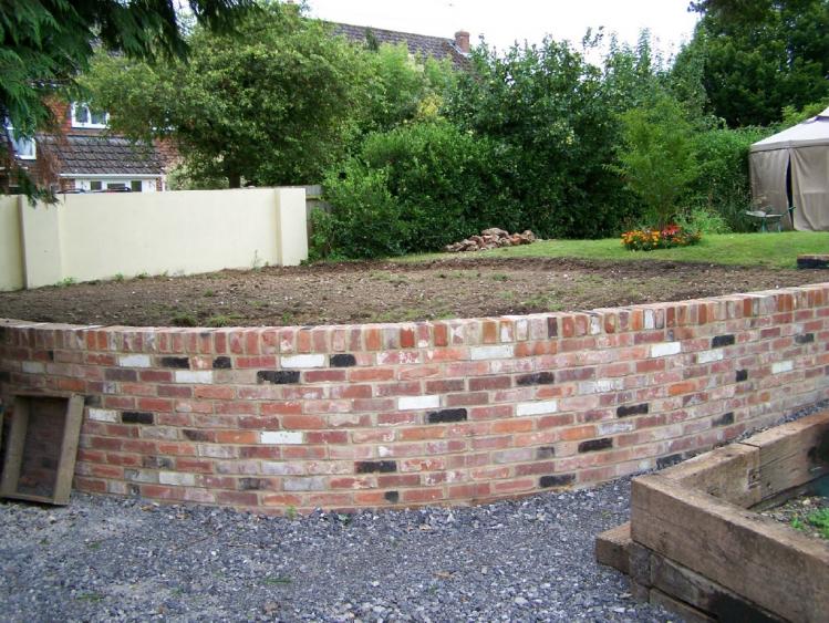 garden 3 - retaining brick wall at bottom of garden