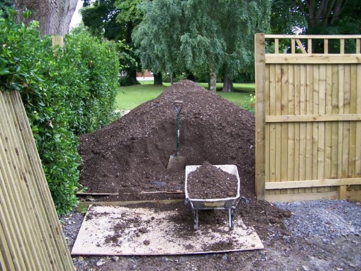 garden 4 - this pile is 14 tons to soil to raise the bottom of the garden; I needed a further 7 tons!