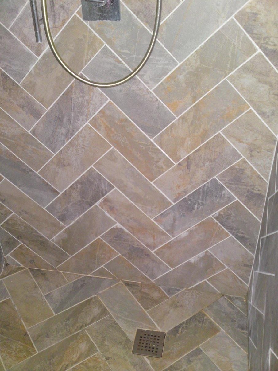 Herringbone - Hand cut from larger format tile to walls and floor in wetroom. 2