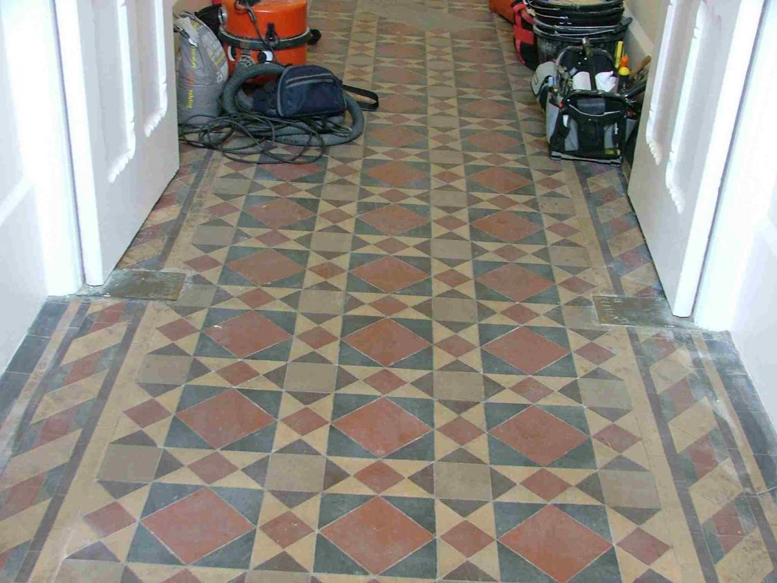 K TH main floor B4 it was cleaned and sealed the missing tiles have been replaced with new & re-claim