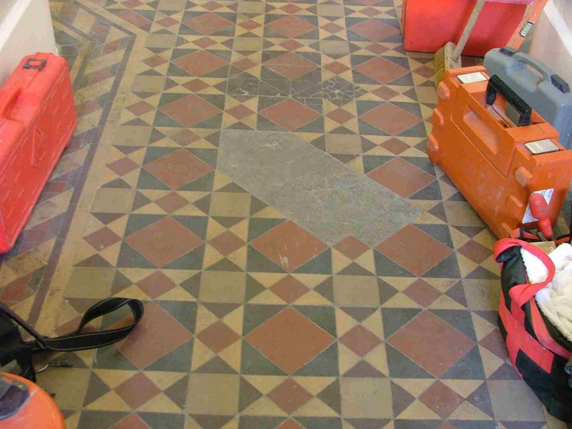 K TH main floor filled in patch of sand&cement this was removed and restored with reclaim & new tiles