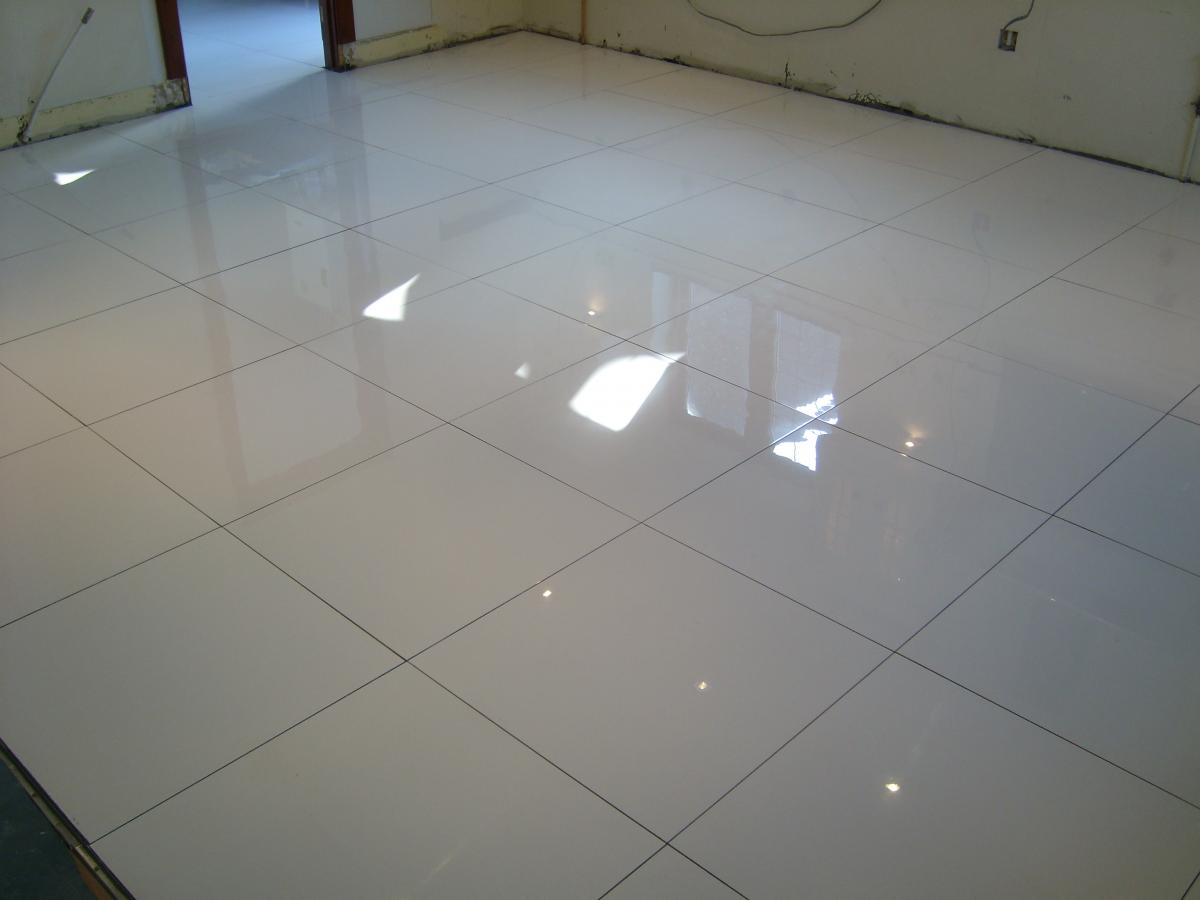 Kitchen Floor Tiling in Ashford Kent.
600 x 600 White Polished Porcelain.