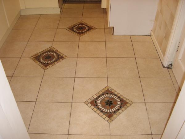 KITCHEN FLOOR WITH MOSAICS INSET