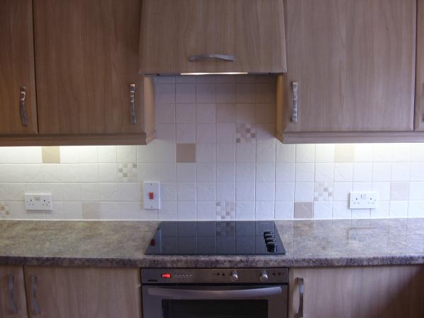 KITCHEN WALLS USING 4 X4 TILES PLUS MOSAICS