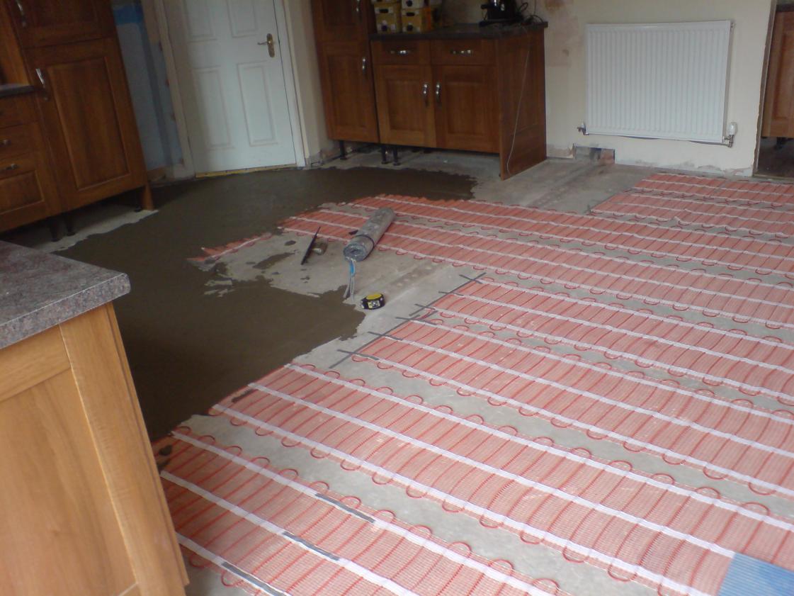 large under tile heating job( required its own circuit ) screeding in the element with 1 part flexi .