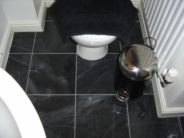 Marble floor, had to cut around sanitary fittings due plumbing constrants, new build.